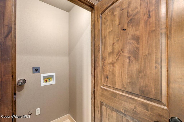 4987 S Bay Pointe Way, Coeur Dalene, ID 83814 - laundry room with hookup for an electric dryer, hookup for a washing machine, and baseboards