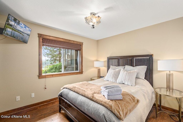 4987 S Bay Pointe Way, Coeur Dalene, ID 83814 - bedroom with baseboards and hardwood / wood-style floors