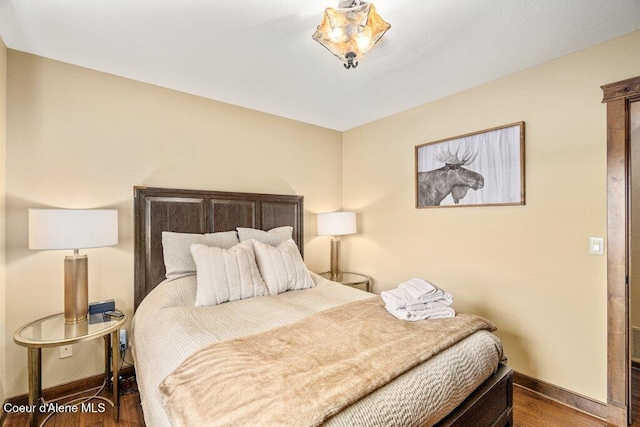 4987 S Bay Pointe Way, Coeur Dalene, ID 83814 - bedroom with wood finished floors and baseboards