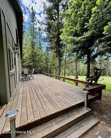 22767 Spruce Ln, Lewiston, ID 83501 - wooden deck with outdoor dining area