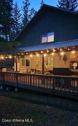 22767 Spruce Ln, Lewiston, ID 83501 - back of property with a deck and metal roof