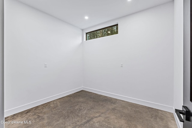 541 N Idaho Club Dr, Sandpoint, ID 83864 - spare room with baseboards, recessed lighting, and dark carpet
