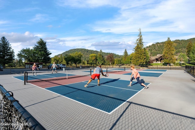 541 N Idaho Club Dr, Sandpoint, ID 83864 - view of tennis court featuring a mountain view and community basketball court