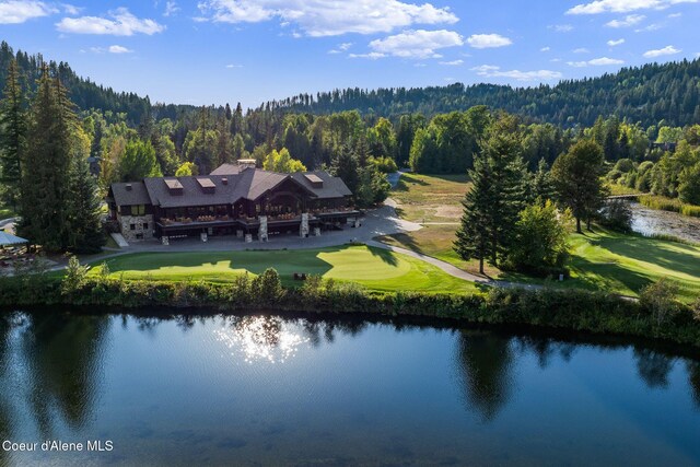 541 N Idaho Club Dr, Sandpoint, ID 83864 - view from above of property with a forest, a nearby body of water, and a golf course