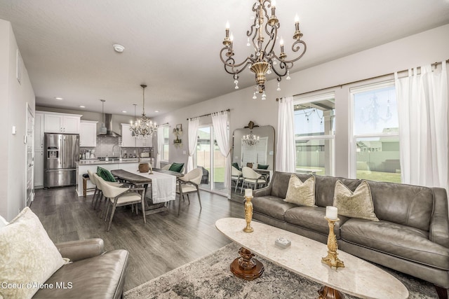 21367 E Acadia Ct, Liberty Lake, WA 99019 - living area with a chandelier, dark wood-style flooring, and recessed lighting