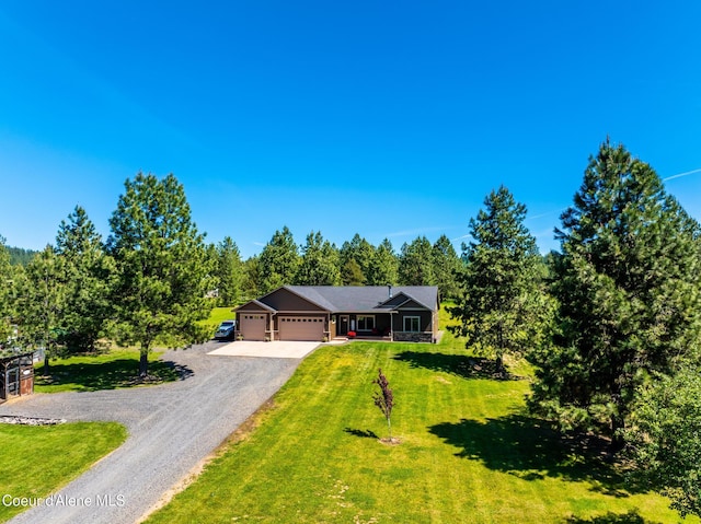 15268 S Potter Rd, Coeur Dalene, ID 83814 - single story home featuring an attached garage, gravel driveway, and a front lawn