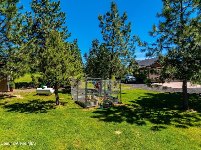 15268 S Potter Rd, Coeur Dalene, ID 83814 - view of green lawn with a vegetable garden