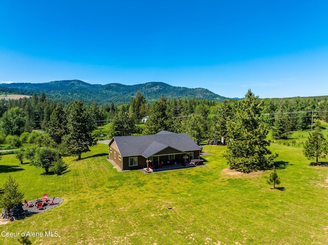 15268 S Potter Rd, Coeur Dalene, ID 83814 - aerial view of property and surrounding area with a heavily wooded area and a mountainous background