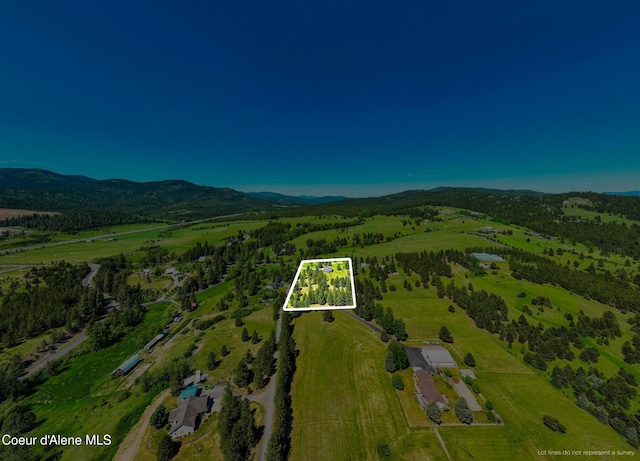 15268 S Potter Rd, Coeur Dalene, ID 83814 - aerial view of sparsely populated area featuring property parcel outlined and a mountainous background