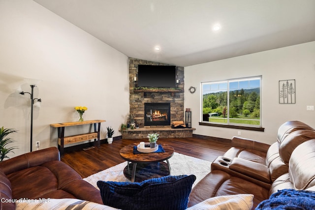 15268 S Potter Rd, Coeur Dalene, ID 83814 - living area featuring vaulted ceiling, wood finished floors, a fireplace, baseboards, and recessed lighting