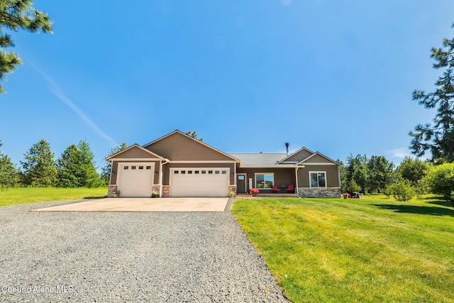 15268 S Potter Rd, Coeur Dalene, ID 83814 - single story home with stone siding, driveway, a garage, and a front yard