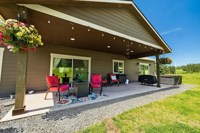 15268 S Potter Rd, Coeur Dalene, ID 83814 - view of patio / terrace with a hot tub