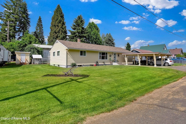 2040 Washington Ave, Saint Maries, ID 83861 - ranch-style home featuring a front lawn and a chimney
