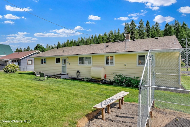 2040 Washington Ave, Saint Maries, ID 83861 - rear view of house featuring oil tank and a chimney
