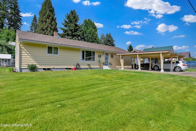 2040 Washington Ave, Saint Maries, ID 83861 - back of property featuring a yard and a chimney