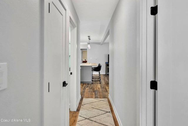 2040 Washington Ave, Saint Maries, ID 83861 - corridor featuring wood finished floors and a desk