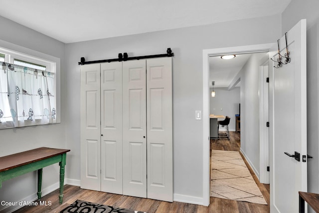 2040 Washington Ave, Saint Maries, ID 83861 - corridor with wood finished floors and a barn door