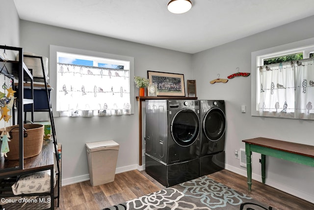 2040 Washington Ave, Saint Maries, ID 83861 - laundry area featuring washing machine and dryer and wood finished floors