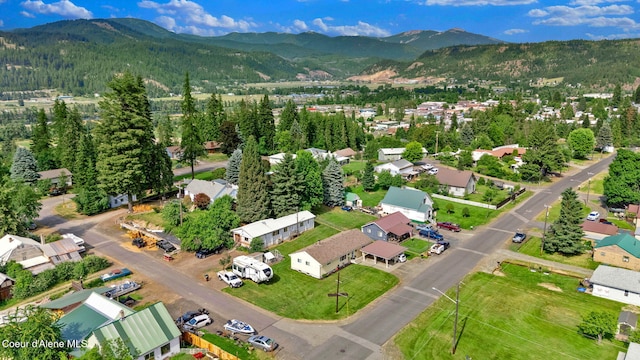 2040 Washington Ave, Saint Maries, ID 83861 - aerial view of property and surrounding area featuring a mountain backdrop and nearby suburban area