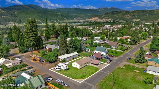 2040 Washington Ave, Saint Maries, ID 83861 - aerial overview of property's location featuring a mountainous background and nearby suburban area