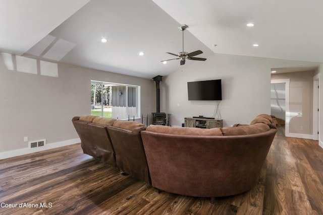 245 Lost Creek Ln, Priest River, ID 83856 - living area featuring a wood stove, dark wood-style floors, a ceiling fan, lofted ceiling, and recessed lighting