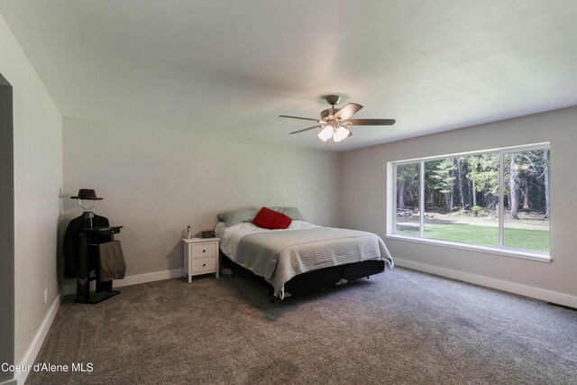 245 Lost Creek Ln, Priest River, ID 83856 - carpeted bedroom featuring baseboards and a ceiling fan
