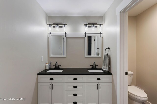 245 Lost Creek Ln, Priest River, ID 83856 - full bathroom with toilet and double vanity