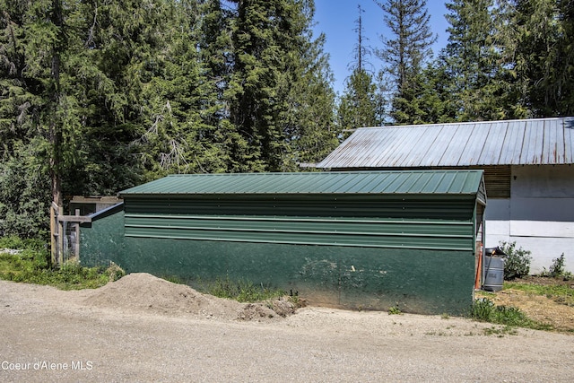 245 Lost Creek Ln, Priest River, ID 83856 - garage featuring a carport