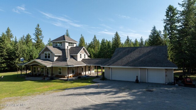 13 Park Dr, Spirit Lake, ID 83869 - view of front of property featuring a porch, a front lawn, and a shingled roof
