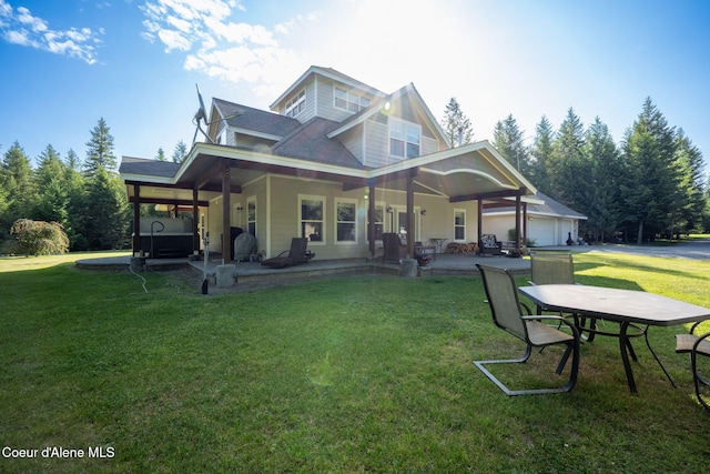 13 Park Dr, Spirit Lake, ID 83869 - back of house with a yard and a patio area