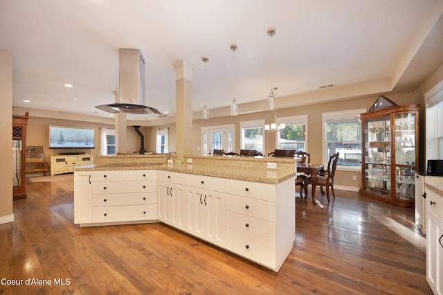 13 Park Dr, Spirit Lake, ID 83869 - kitchen with island range hood, recessed lighting, dark wood-type flooring, pendant lighting, and a chandelier