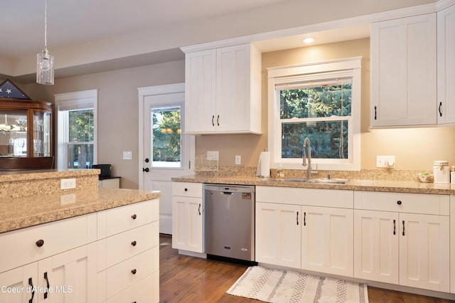 13 Park Dr, Spirit Lake, ID 83869 - kitchen with dishwasher, a sink, white cabinetry, wood finished floors, and hanging light fixtures