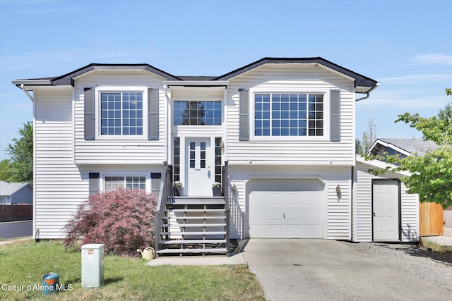 3203 N 12th St, Coeur Dalene, ID 83815 - view of front of house with a garage and driveway
