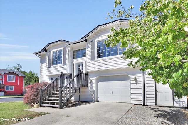 3203 N 12th St, Coeur Dalene, ID 83815 - split foyer home with a garage and concrete driveway