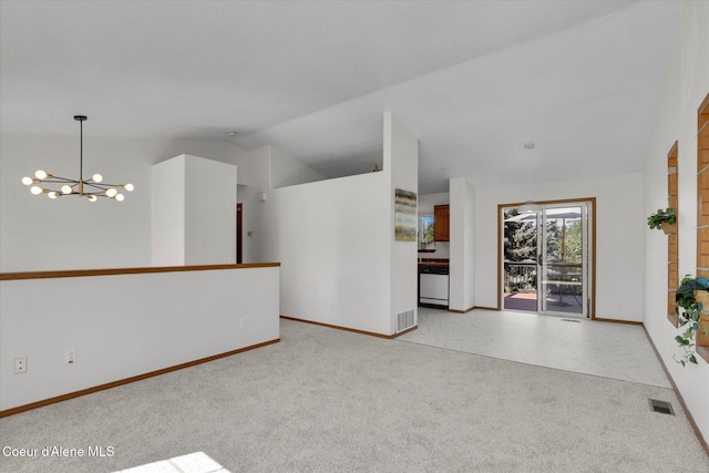 3203 N 12th St, Coeur Dalene, ID 83815 - carpeted spare room featuring a chandelier and vaulted ceiling