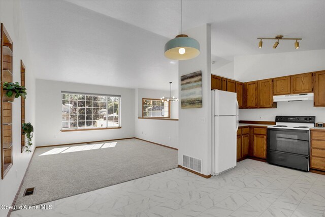 3203 N 12th St, Coeur Dalene, ID 83815 - kitchen with electric stove, freestanding refrigerator, under cabinet range hood, light colored carpet, and brown cabinetry