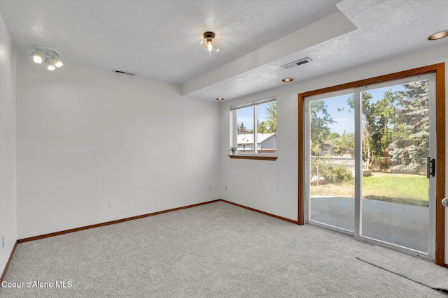 3203 N 12th St, Coeur Dalene, ID 83815 - carpeted spare room featuring a textured ceiling