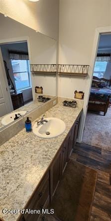 229 Henderson Lp, Kamiah, ID 83536 - bathroom featuring vanity and wood finished floors