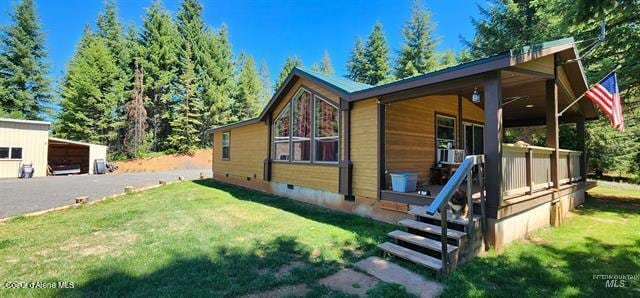 229 Henderson Lp, Kamiah, ID 83536 - view of front of home featuring a front lawn and crawl space