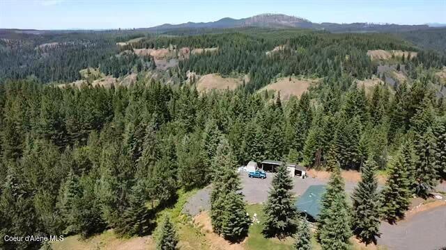 229 Henderson Lp, Kamiah, ID 83536 - drone / aerial view of a heavily wooded area and mountains
