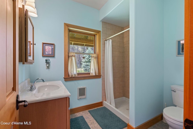 9307 Lakeshore Dr, Sagle, ID 83860 - bathroom with vanity, heating unit, and tiled shower