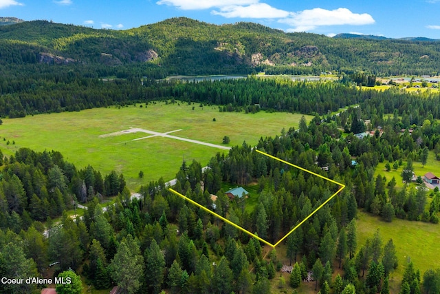 9307 Lakeshore Dr, Sagle, ID 83860 - aerial view of property and surrounding area with a forest and property boundaries highlighted