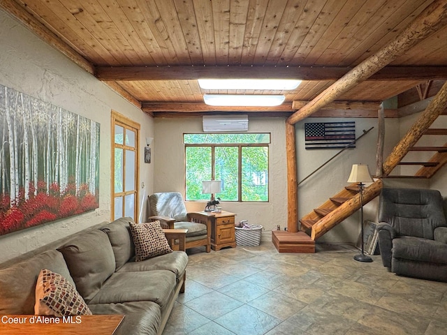 197 Berry Hl, Cocolalla, ID 83813 - living room with a wall mounted air conditioner, a wood ceiling with exposed beams, and a textured wall