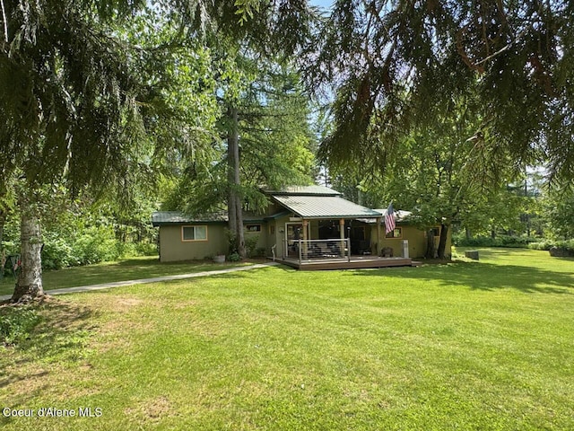 197 Berry Hl, Cocolalla, ID 83813 - rear view of house featuring a yard and a deck