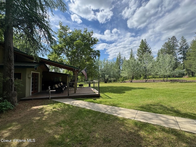 197 Berry Hl, Cocolalla, ID 83813 - view of green lawn with a deck