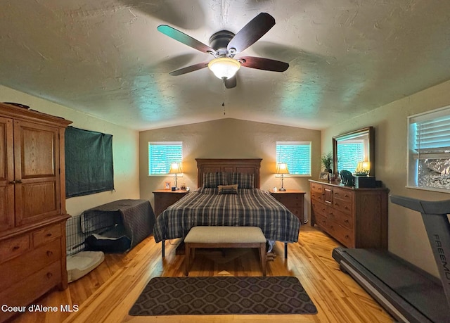 197 Berry Hl, Cocolalla, ID 83813 - bedroom featuring vaulted ceiling, light wood-type flooring, and a ceiling fan