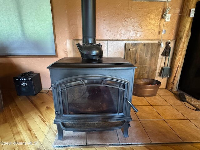 197 Berry Hl, Cocolalla, ID 83813 - detailed view of a wood stove and a textured wall