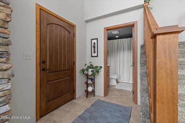 106 Stewart Dr, Blanchard, ID 83804 - entrance foyer with light tile patterned floors