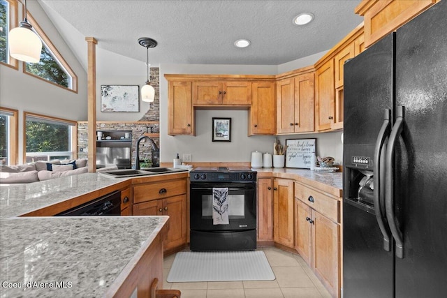 106 Stewart Dr, Blanchard, ID 83804 - kitchen featuring black appliances, light tile patterned flooring, a sink, a textured ceiling, and hanging light fixtures