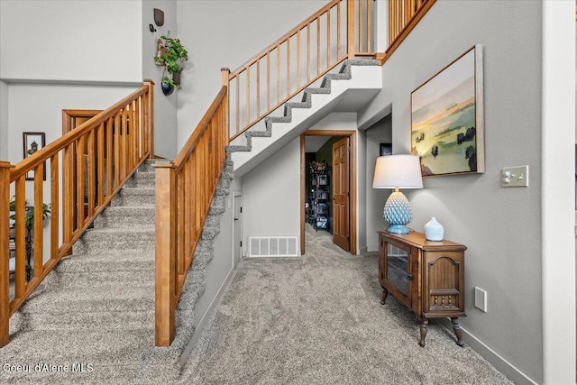 106 Stewart Dr, Blanchard, ID 83804 - stairs with carpet flooring and baseboards